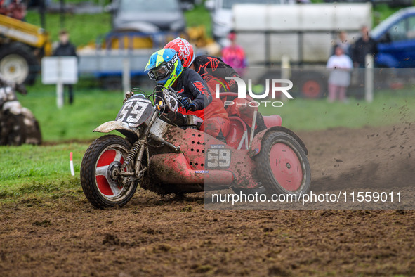 Steve Adams and Johnny Childs (59) compete in the 1000cc Sidecar Class during the ACU British Upright Championships in Woodhouse Lance, Gaws...