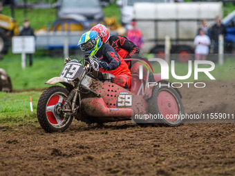 Steve Adams and Johnny Childs (59) compete in the 1000cc Sidecar Class during the ACU British Upright Championships in Woodhouse Lance, Gaws...