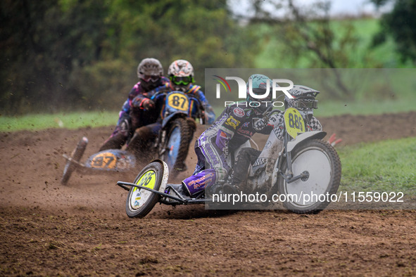 Phill Rowlands and Tom Rowlands (886) lead Richard Fred Jenner and Scott Gutteridge (87) in the 500cc Sidecar Final during the ACU British U...