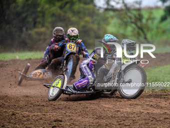 Phill Rowlands and Tom Rowlands (886) lead Richard Fred Jenner and Scott Gutteridge (87) in the 500cc Sidecar Final during the ACU British U...