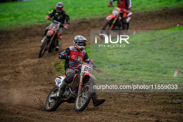 Jonathan Dowd (28) leads John Thompson (22) in the Adult Motocross Support Class Final during the ACU British Upright Championships in Gawsw...