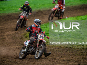 Jonathan Dowd (28) leads John Thompson (22) in the Adult Motocross Support Class Final during the ACU British Upright Championships in Gawsw...