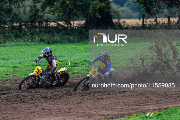 Tony Atkin (10) rides inside Tim Curnock (726) to lead the Upright 500cc Final during the ACU British Upright Championships in Gawsworth, Ch...