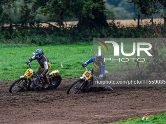 Tony Atkin (10) rides inside Tim Curnock (726) to lead the Upright 500cc Final during the ACU British Upright Championships in Gawsworth, Ch...