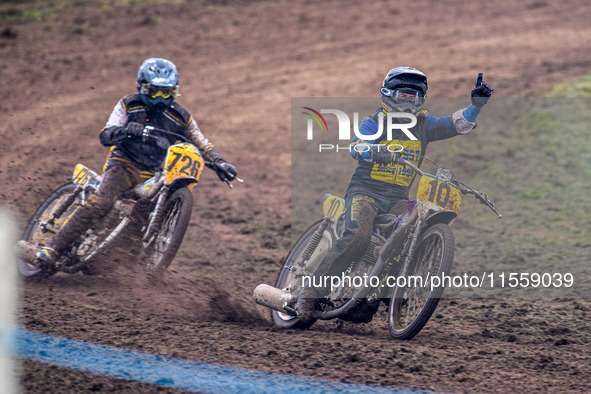 Tony Atkin (10) celebrates winning the British Upright 500cc Championship ahead of Tim Curnock (726) during the ACU British Upright Champion...