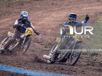 Tony Atkin (10) celebrates winning the British Upright 500cc Championship ahead of Tim Curnock (726) during the ACU British Upright Champion...