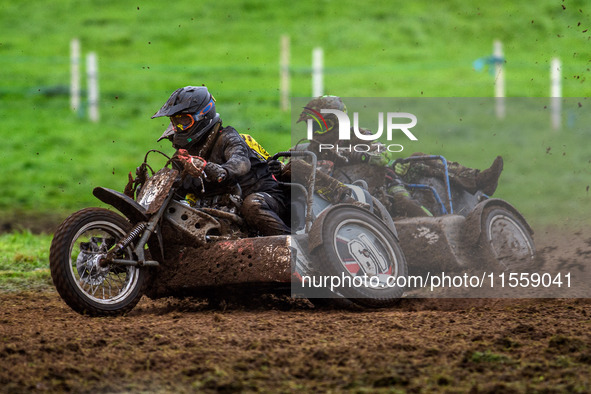 Andy Minard and Lewis Davis (19) lead Billy Winterburn and Ryan Wharton (94) in the 1000cc Sidecar Class Final during the ACU British Uprigh...