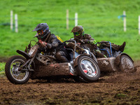 Andy Minard and Lewis Davis (19) lead Billy Winterburn and Ryan Wharton (94) in the 1000cc Sidecar Class Final during the ACU British Uprigh...