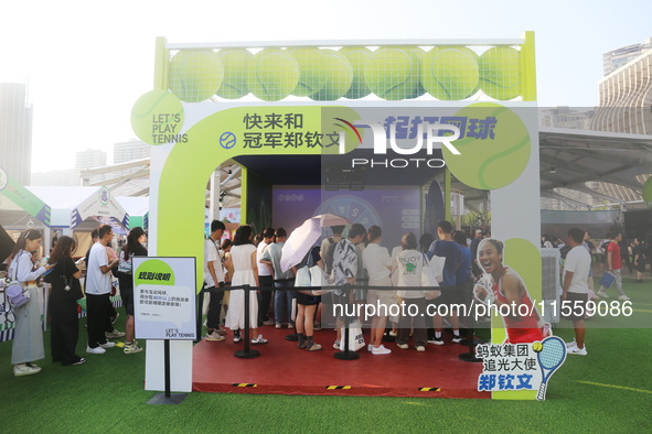 Chinese tennis star Zheng Qinwen speaks for an advertisement of Ant Group during the INCLUSION Conference on the Bund in Shanghai, China, on...