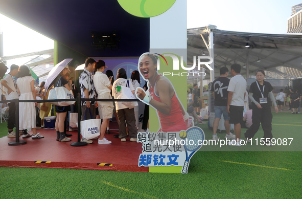 Chinese tennis star Zheng Qinwen speaks for an advertisement of Ant Group during the INCLUSION Conference on the Bund in Shanghai, China, on...