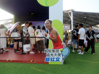 Chinese tennis star Zheng Qinwen speaks for an advertisement of Ant Group during the INCLUSION Conference on the Bund in Shanghai, China, on...