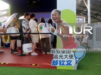 Chinese tennis star Zheng Qinwen speaks for an advertisement of Ant Group during the INCLUSION Conference on the Bund in Shanghai, China, on...