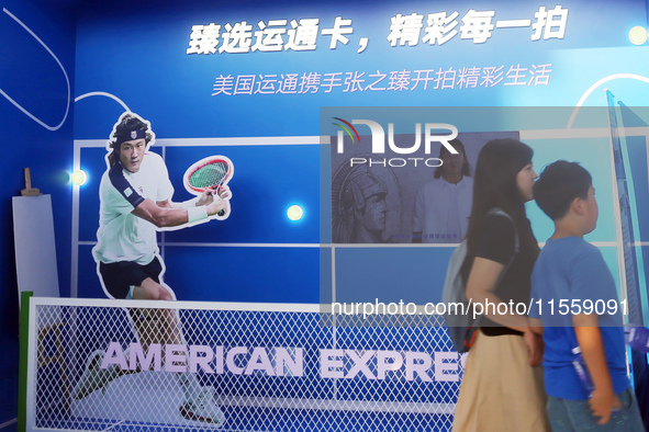 Chinese tennis star Zhang Zhizhen speaks for an advertisement of American Express during the INCLUSION Conference on the Bund in Shanghai, C...