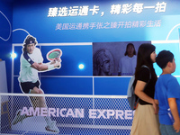 Chinese tennis star Zhang Zhizhen speaks for an advertisement of American Express during the INCLUSION Conference on the Bund in Shanghai, C...