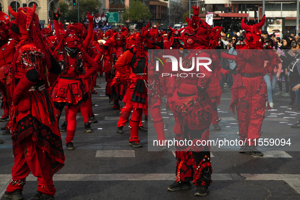 Pilgrims commemorate the victims of the Civilian-Military Dictatorship led by Augusto Pinochet at the General Cemetery in Santiago, Chile, o...