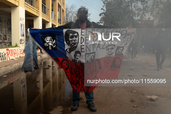 Pilgrims commemorate the victims of the Civilian-Military Dictatorship led by Augusto Pinochet at the General Cemetery in Santiago, Chile, o...