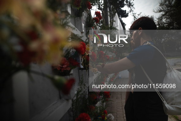 Pilgrims commemorate the victims of the Civilian-Military Dictatorship led by Augusto Pinochet at the General Cemetery in Santiago, Chile, o...