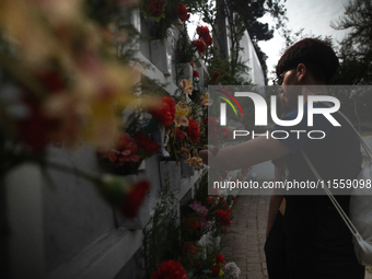 Pilgrims commemorate the victims of the Civilian-Military Dictatorship led by Augusto Pinochet at the General Cemetery in Santiago, Chile, o...