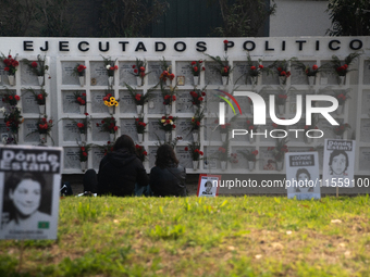 Pilgrims commemorate the victims of the Civilian-Military Dictatorship led by Augusto Pinochet at the General Cemetery in Santiago, Chile, o...