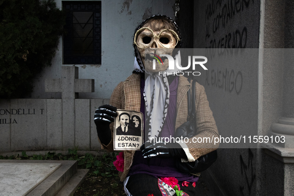 Pilgrims commemorate the victims of the Civilian-Military Dictatorship led by Augusto Pinochet at the General Cemetery in Santiago, Chile, o...