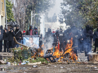 Protesters light barricades at the General Cemetery in Chile on September 8, 2024, where the traditional pilgrimage commemorating the coup d...