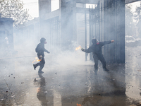 Demonstrators clash with police at the General Cemetery in Chile on September 8, 2024, at the end of the traditional pilgrimage commemoratin...