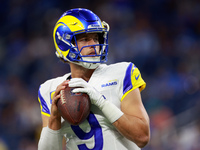 DETROIT,MICHIGAN-SEPTEMBER 9: Quarterback Matthew Stafford (9) of the Los Angeles Rams prepares to throw the ball ahead of a game between th...