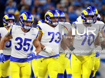 DETROIT,MICHIGAN-SEPTEMBER 9:  Offensive tackle Joe Noteboom (70) of the Los Angeles Rams, linebacker Jacob Hummel (35) of the Los Angeles R...