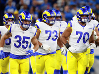 DETROIT,MICHIGAN-SEPTEMBER 9:  Offensive tackle Joe Noteboom (70) of the Los Angeles Rams, linebacker Jacob Hummel (35) of the Los Angeles R...