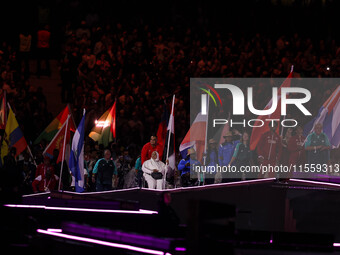 Flag bearers parade with their national flags during the closing ceremony on day eleven of the Paris 2024 Summer Paralympic Games at Stade d...