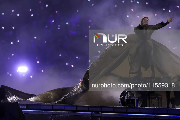 French singer Santa performs during the Paris 2024 Paralympic Games Closing Ceremony on day eleven of the Paris 2024 Summer Paralympic Games...