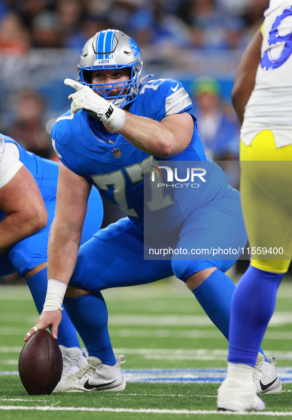 DETROIT,MICHIGAN-SEPTEMBER 8:  Center Frank Ragnow (77) of the Detroit Lions gestures as he prepares to snap the ball during a game between...