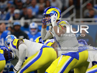 DETROIT,MICHIGAN-SEPTEMBER 8: Los Angeles Rams quarterback Matthew Stafford (9) signals before the snap during the first half of an NFL foot...