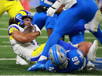 DETROIT,MICHIGAN-SEPTEMBER 8: Los Angeles Rams wide receiver Puka Nacua (17) is tackled by Detroit Lions linebacker Jack Campbell (46) durin...