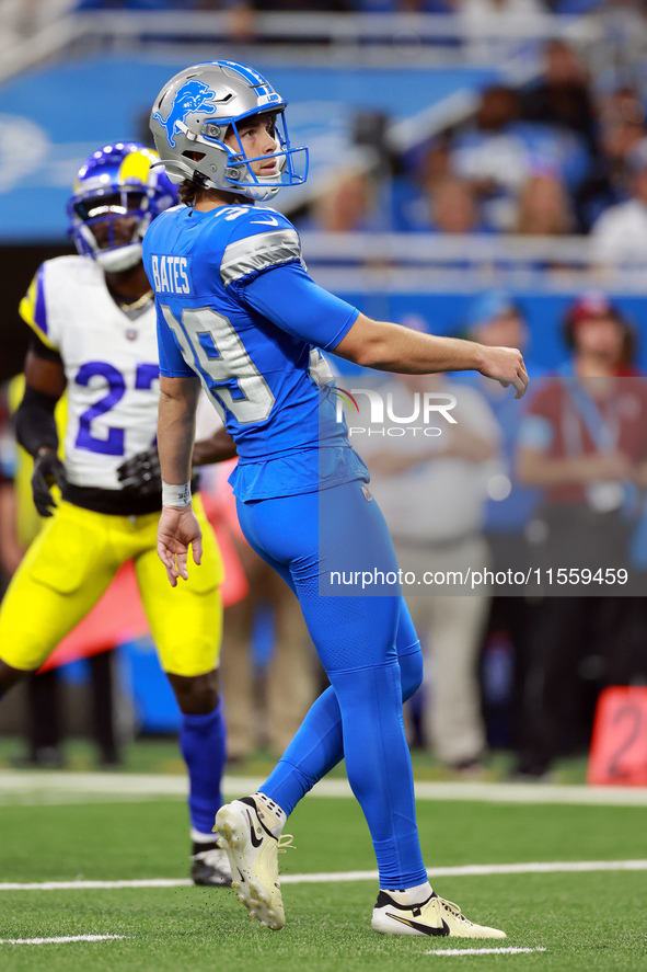 DETROIT,MICHIGAN-SEPTEMBER 8:  Detroit Lions kicker Jake Bates (39) follows his field goal kick during a game between the Detroit Lions and...