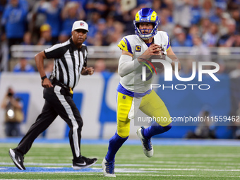 DETROIT,MICHIGAN-SEPTEMBER 8:  Quarterback Matthew Stafford (9) of the Los Angeles Rams looks to pass the ball during a game between the Det...