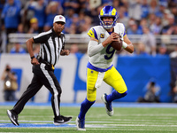 DETROIT,MICHIGAN-SEPTEMBER 8:  Quarterback Matthew Stafford (9) of the Los Angeles Rams looks to pass the ball during a game between the Det...