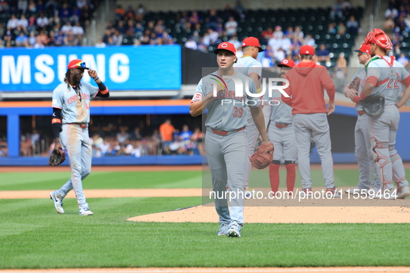 Cincinnati Reds pitcher Julian Aguiar #39 leaves the game during the fifth inning of the baseball game against the New York Mets at Citi Fie...