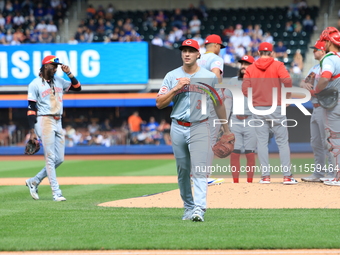 Cincinnati Reds pitcher Julian Aguiar #39 leaves the game during the fifth inning of the baseball game against the New York Mets at Citi Fie...