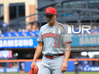 Cincinnati Reds pitcher Julian Aguiar #39 leaves the game during the fifth inning of the baseball game against the New York Mets at Citi Fie...