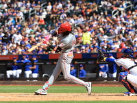 Cincinnati Reds' Elly De La Cruz #44 singles during the sixth inning of the baseball game against the New York Mets at Citi Field in Corona,...