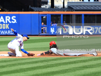 Cincinnati Reds' Elly De La Cruz #44 is caught stealing during the fourth inning of the baseball game against the New York Mets at Citi Fiel...