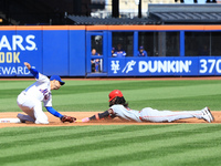 Cincinnati Reds' Elly De La Cruz #44 is caught stealing during the fourth inning of the baseball game against the New York Mets at Citi Fiel...