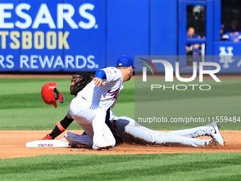 Cincinnati Reds' Elly De La Cruz #44 is caught stealing during the fourth inning of the baseball game against the New York Mets at Citi Fiel...