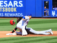 Cincinnati Reds' Elly De La Cruz #44 is caught stealing during the fourth inning of the baseball game against the New York Mets at Citi Fiel...