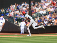 Cincinnati Reds' Elly De La Cruz #44 takes off for second base on a failed pickoff attempt during the sixth inning of the baseball game agai...