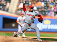 Cincinnati Reds pitcher Alexis Diaz #43 throws during the ninth inning of the baseball game against the New York Mets at Citi Field in Coron...