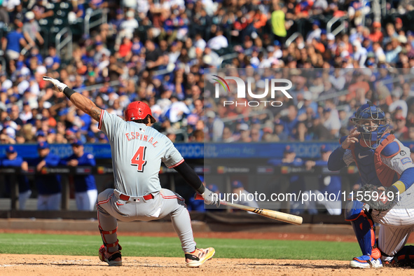 Cincinnati Reds' Santiago Espinal #4 is brushed back by a pitch during the seventh inning of the baseball game against the New York Mets at...