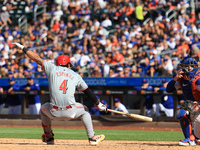 Cincinnati Reds' Santiago Espinal #4 is brushed back by a pitch during the seventh inning of the baseball game against the New York Mets at...