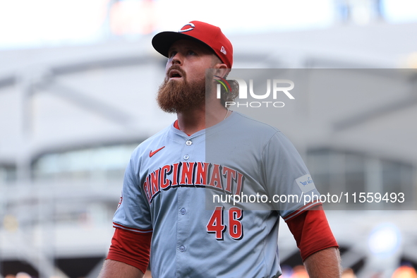 Cincinnati Reds pitcher Buck Farmer #46 comes off the field during the eighth inning of the baseball game against the New York Mets at Citi...